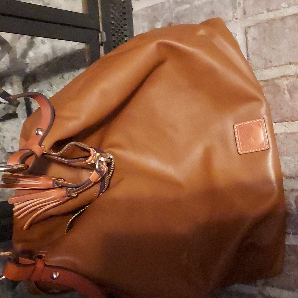 A brown leather boho bag